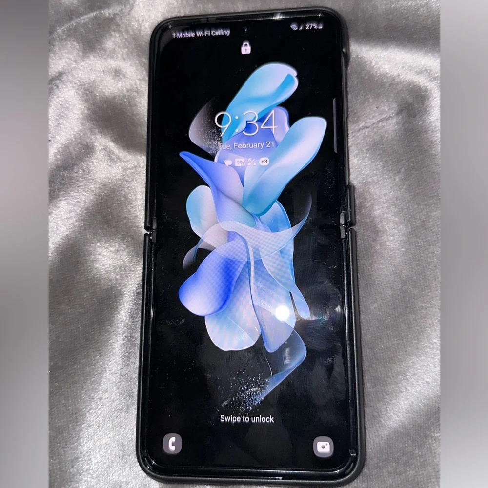 Black Foldable Smartphone with Blue Display